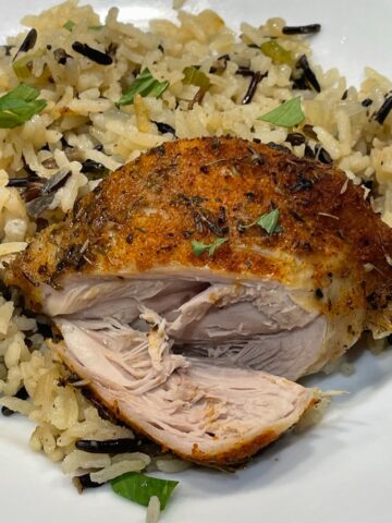 baked chicken with seasoned white and wild rice