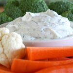 ranch dip and dressing spice mix in a bowl with veggies