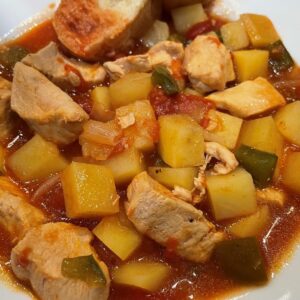 spicy chicken and potato soup in a bowl