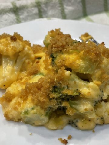 broccoli and cauliflower in a cheesy sauce topped with panko butter crumbs