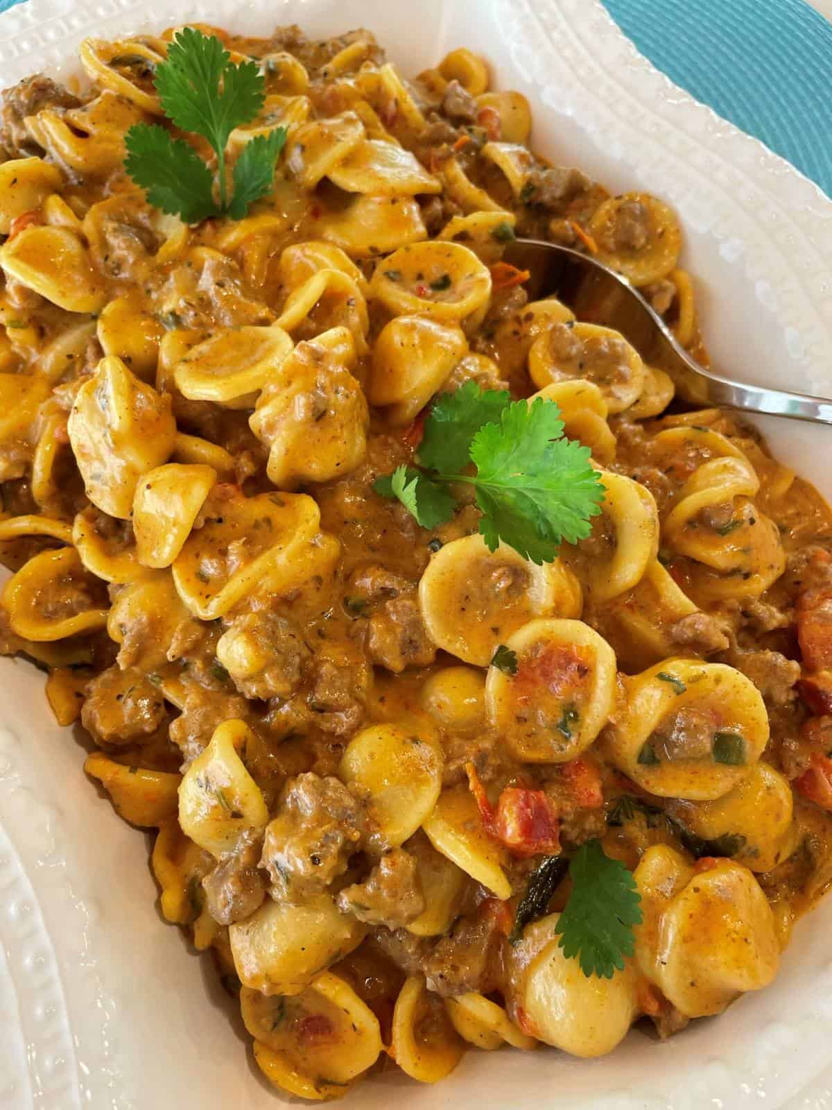 taco pasta casserole seasoned ground beef with a creamy cheesy sauce and pasta
